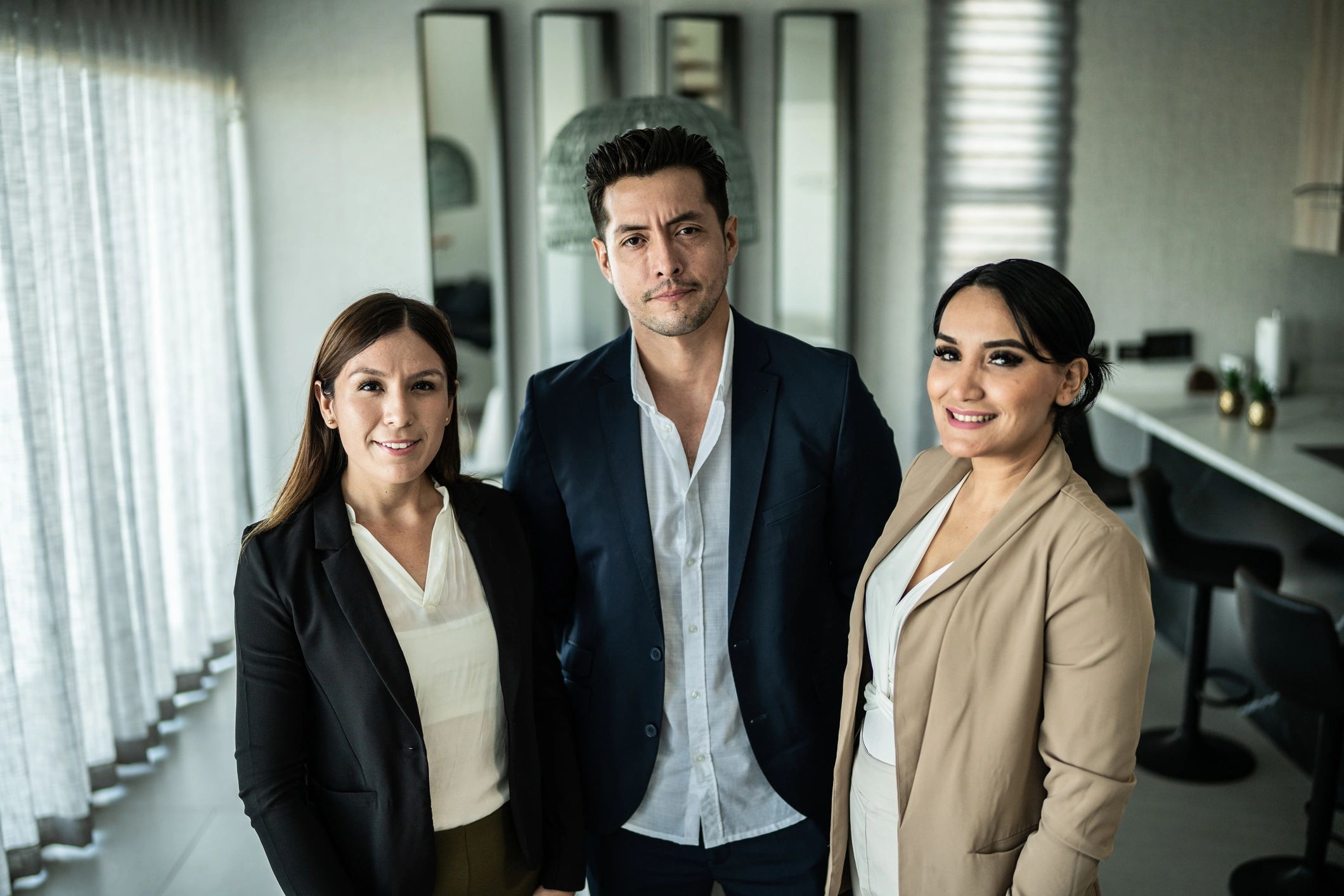 Real estate team collaborating in office